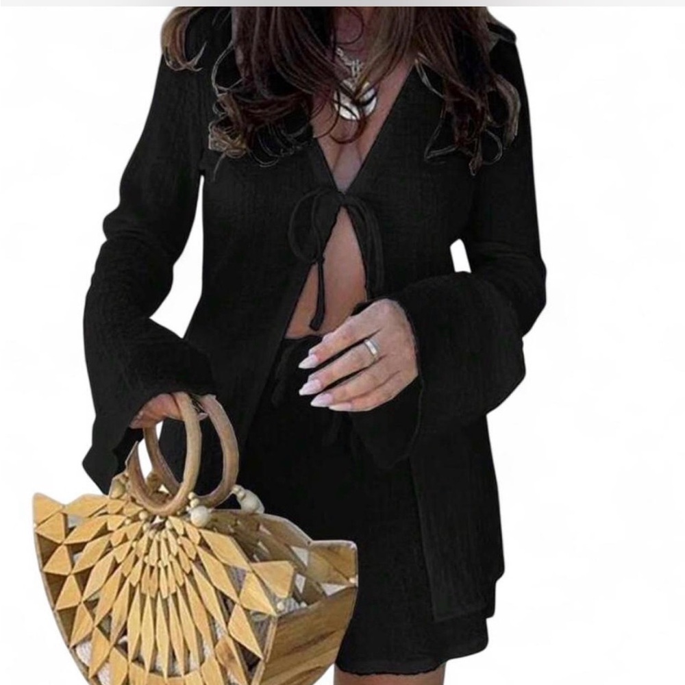 Black two piece set. Long flare sleeve tie top with shorts